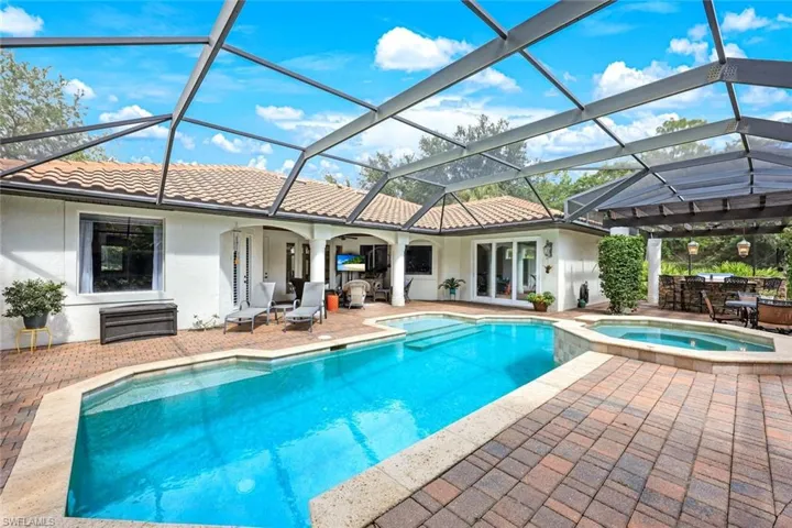 Property features a beautifully maintained heated swimming pool, perfect for relaxation and recreation, complemented by a relaxing spa
