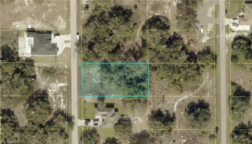 Aerial overview of property's location with property parcel outlined