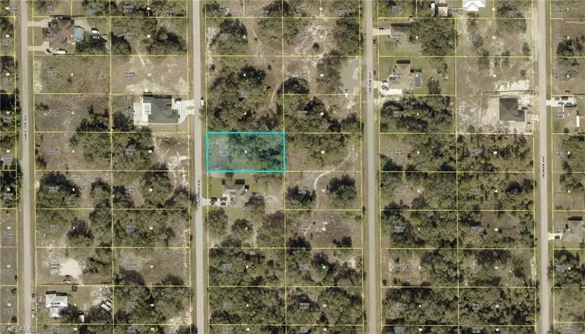 Aerial view of property's location featuring property parcel outlined