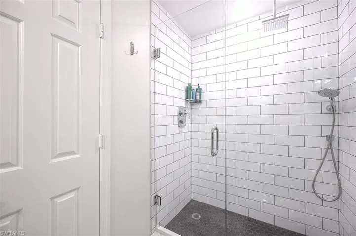 Bathroom featuring walk in shower