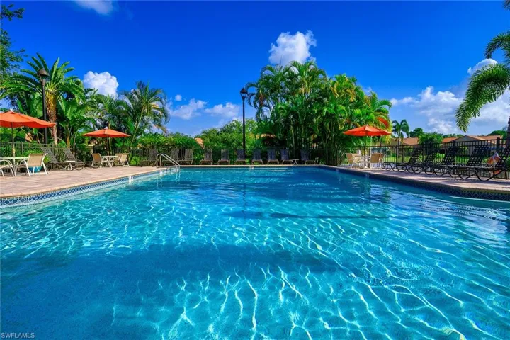 View of swimming pool with spa in main pool
