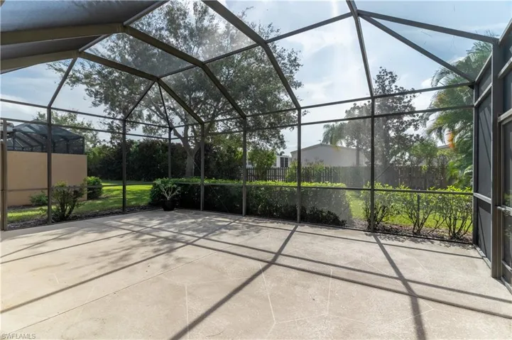 View of patio / terrace featuring glass enclosure and a sunroom