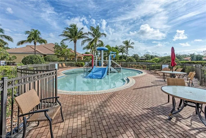 Community pool with a patio area