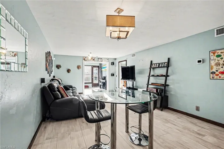 Dining room with light wood-type flooring