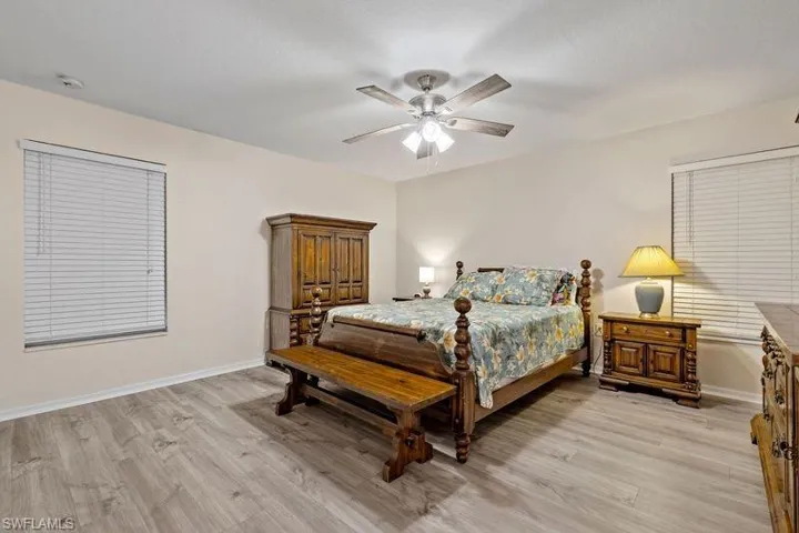 Master Bedroom featuring ceiling fan and light hardwood / wood-style floors