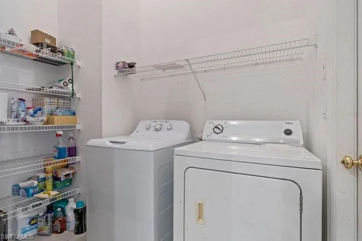 Inside Laundry area featuring washer and dryer