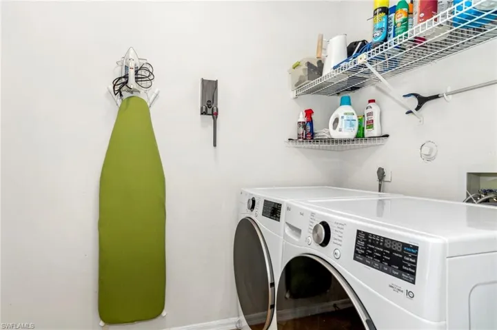 Laundry room featuring washer and dryer
