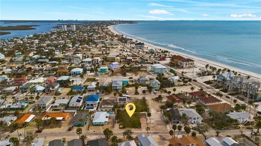 Bird's eye view with a water view and a view of the beach - Virtually Edited Image