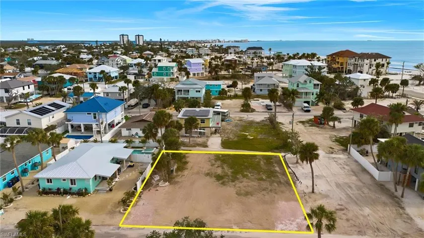 Drone / aerial view with a water view and a residential view - Virtually Edited Image