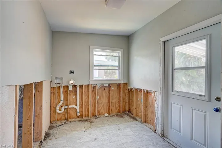 Doorway to outside featuring a healthy amount of sunlight