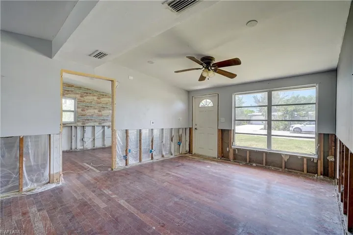 Unfurnished room featuring ceiling fan