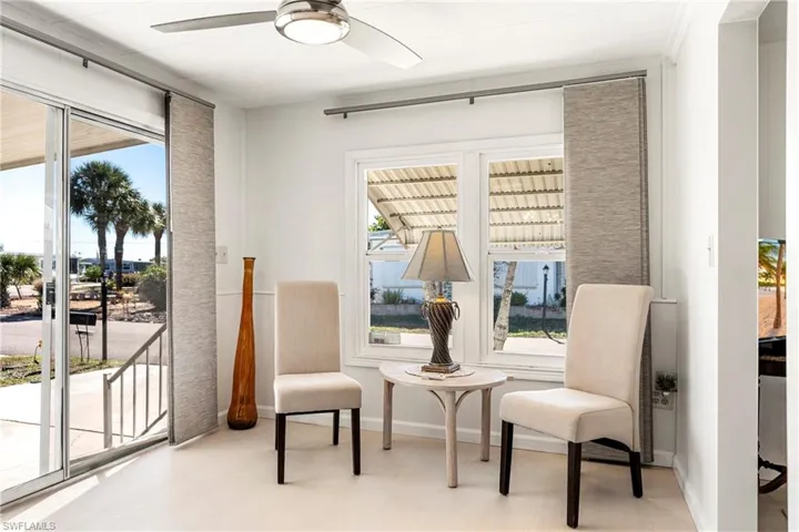 Living area featuring baseboards
