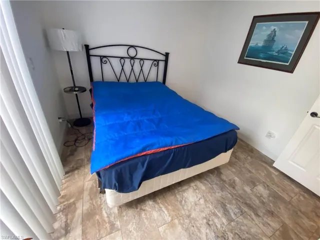 Bedroom with baseboards