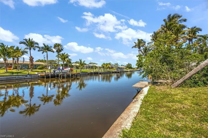 Water view with a boat dock