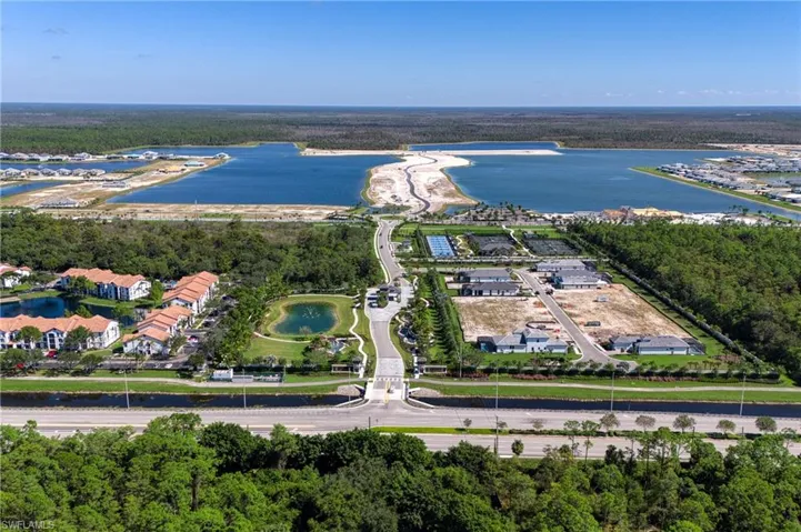 Wide angle drone view revealing the community’s waterfront inspired design.