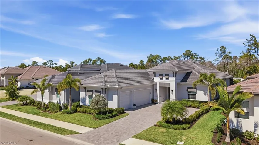 Sophisticated single story façade showcasing modern coastal architecture in Caymas.