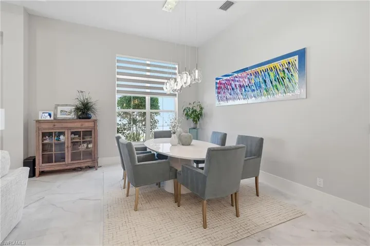 Formal dining space positioned just off the kitchen, ideal for hosting dinner parties and holiday gatherings.