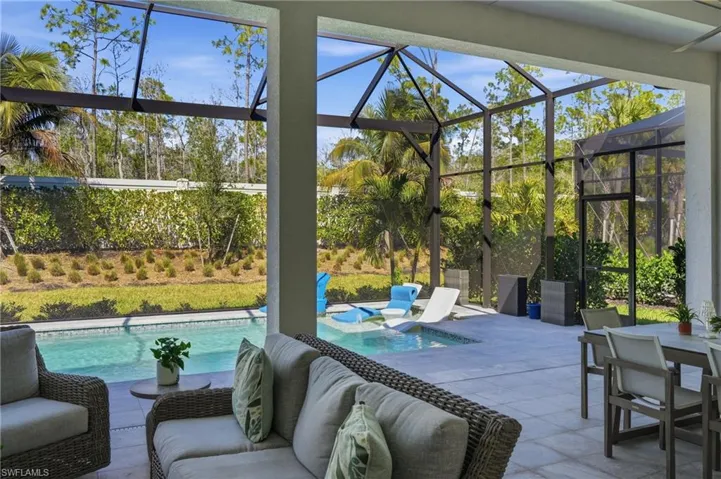 Preserve backdrop offering lush greenery and natural privacy.
