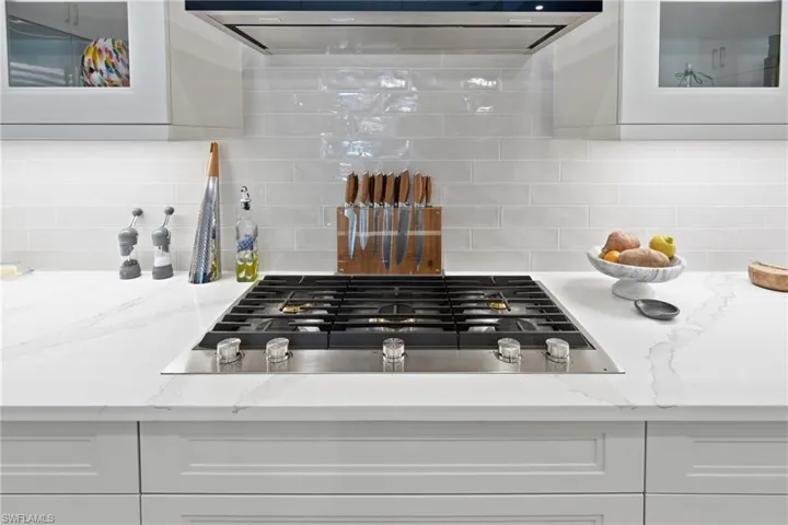 Gas cooking, generous storage and a statement island make this kitchen the heart of the home.
