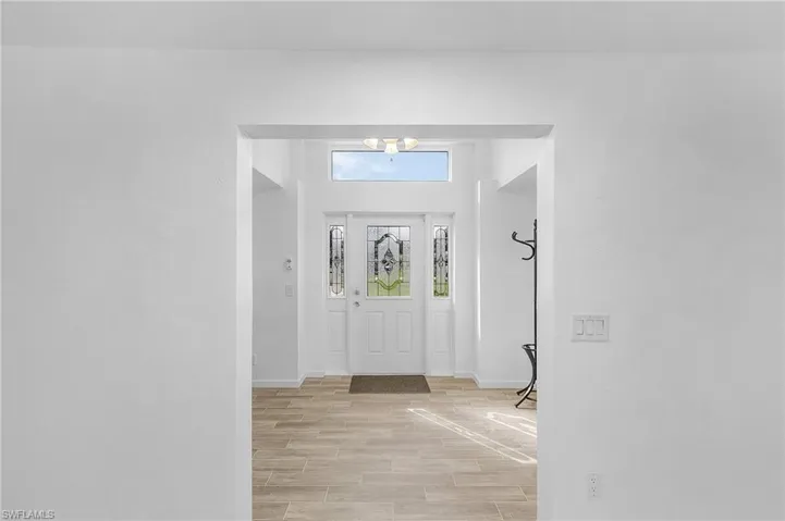 Foyer with light wood-type flooring