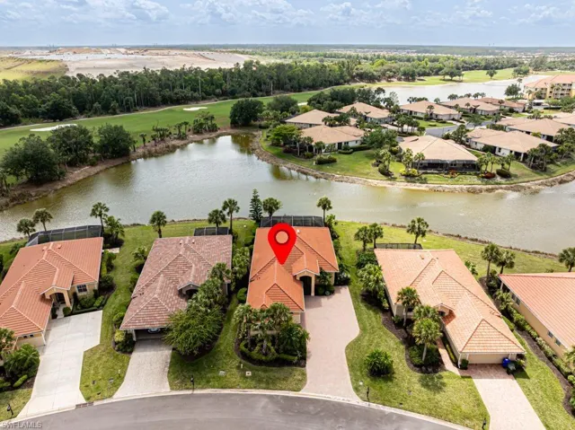 Drone / aerial view featuring a water view and a residential view
