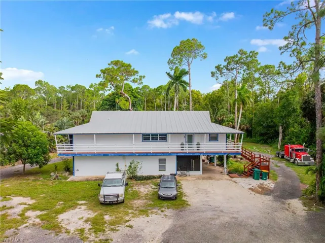 View of front of home featuring a metal roof