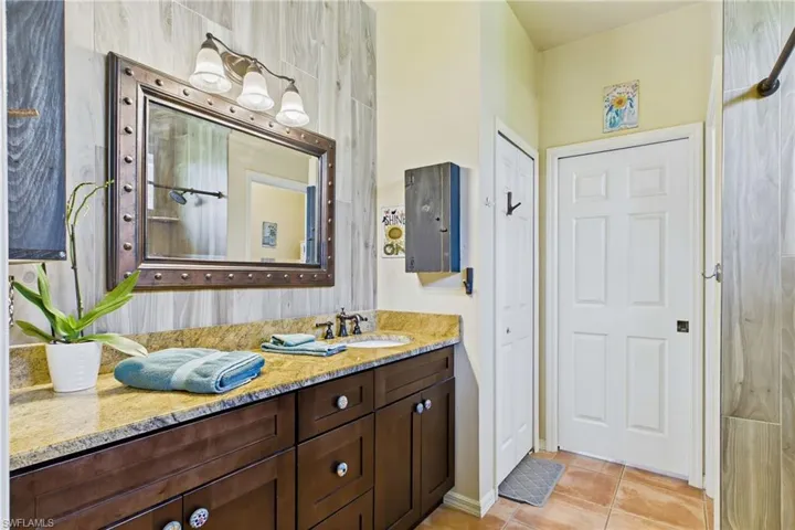 Beautifully updated coastal-inspired primary bathroom.