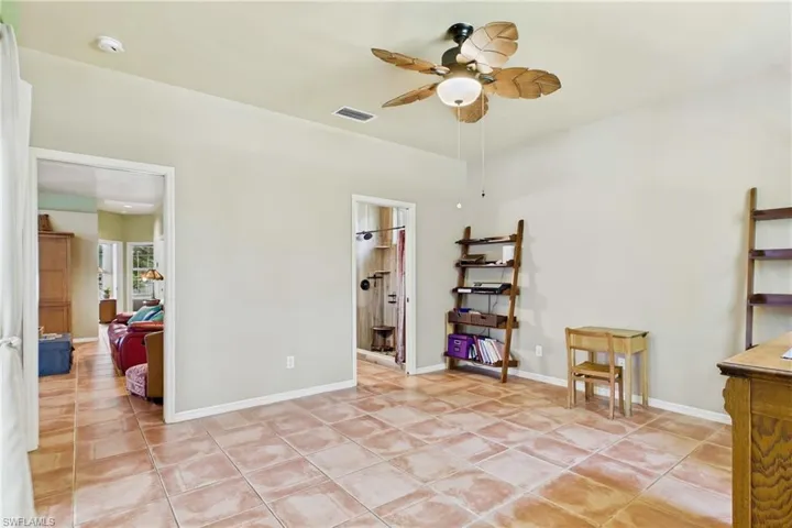 Relax and unwind in this inviting primary retreat.