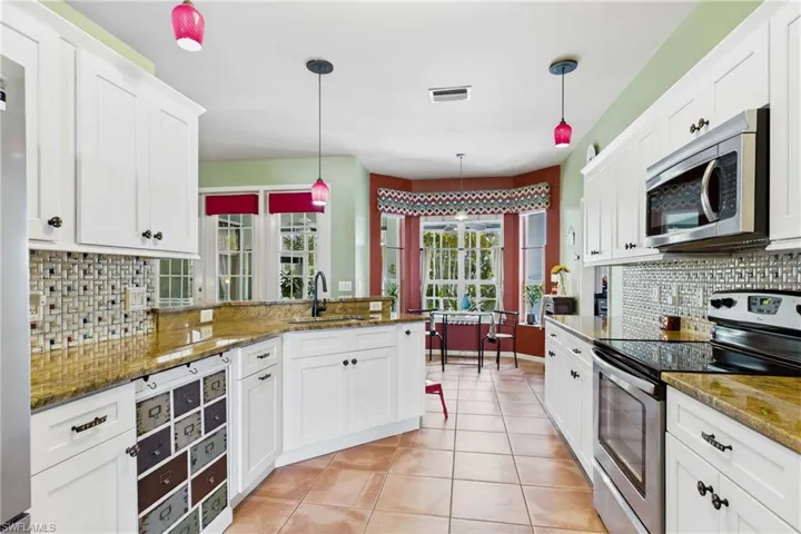 Gather with family and friends around this spacious kitchen with room for everyone.