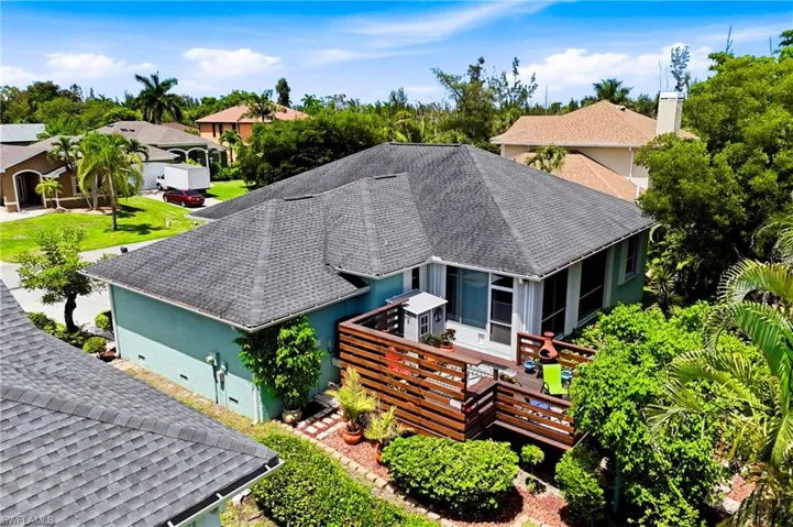 Step outside and enjoy this backyard sanctuary featuring a beautiful deck, shaded areas, and plenty of space to garden or unwind.