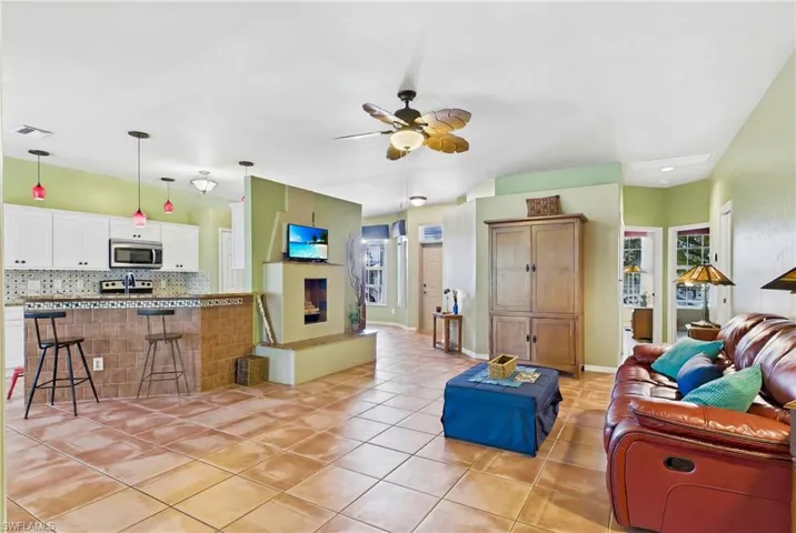Spacious living room with abundant natural light and an open-concept design.