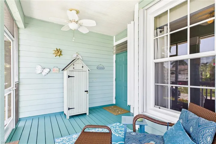 Relax and unwind on the charming front screened lanai, the perfect spot to enjoy your morning coffee, evening breezes, and the peaceful Florida lifestyle.