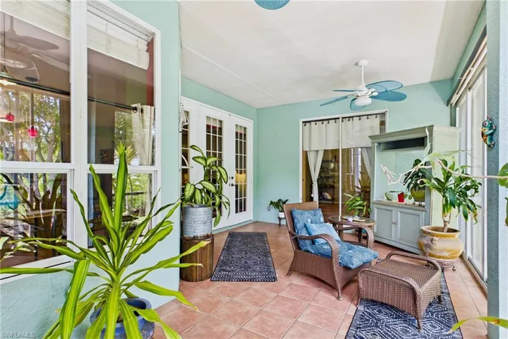 A wonderful extension of the living space, this screened lanai provides a shaded and breezy spot to relax and entertain.