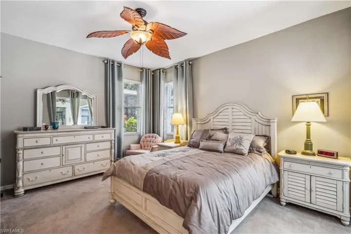 Bedroom with carpet floors and ceiling fan