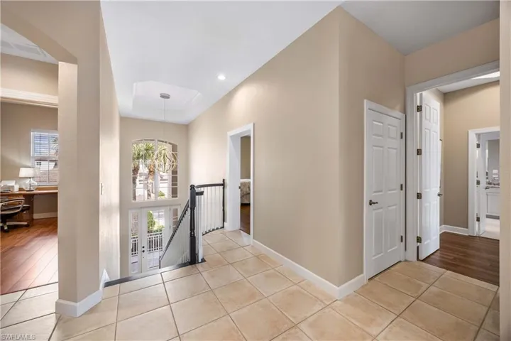 #202, upstairs unit, privacy. Elevator closet available. Would need to add elevator.