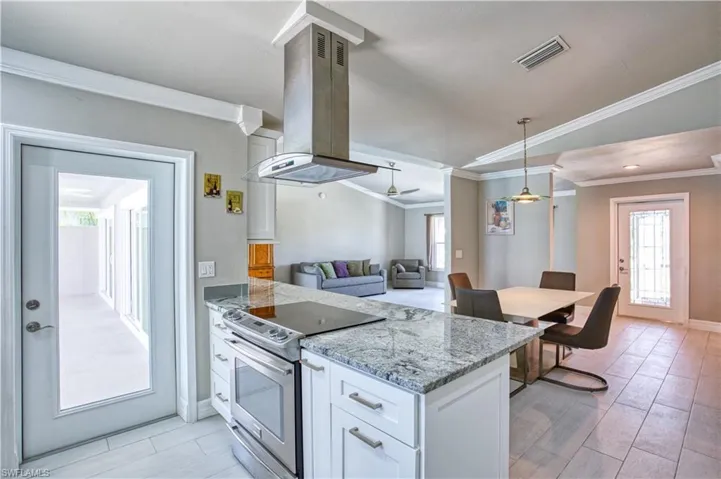 Kitchen door provides access to Lanai for indoor / outdoor cooking entertaining