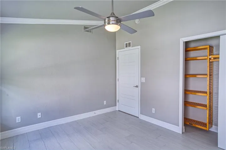 Front bedroom, beautiful wood closet shelves