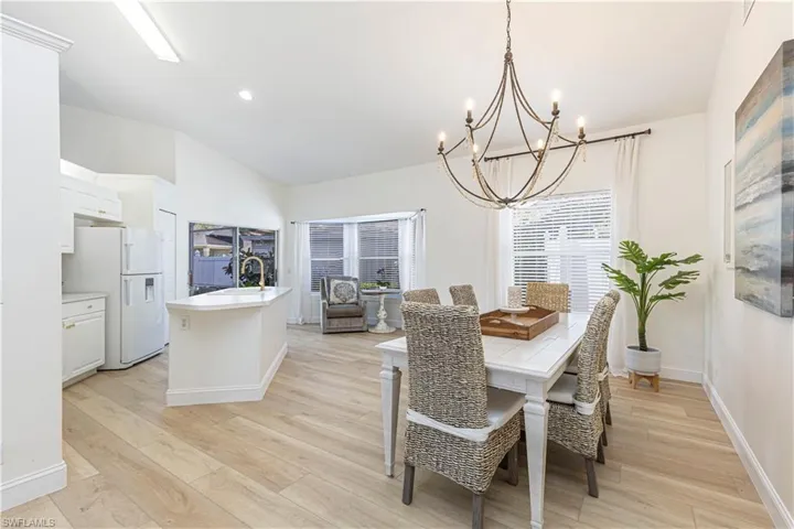Dining area featuring a an abundance of natural sunlight and light wood-type flooring