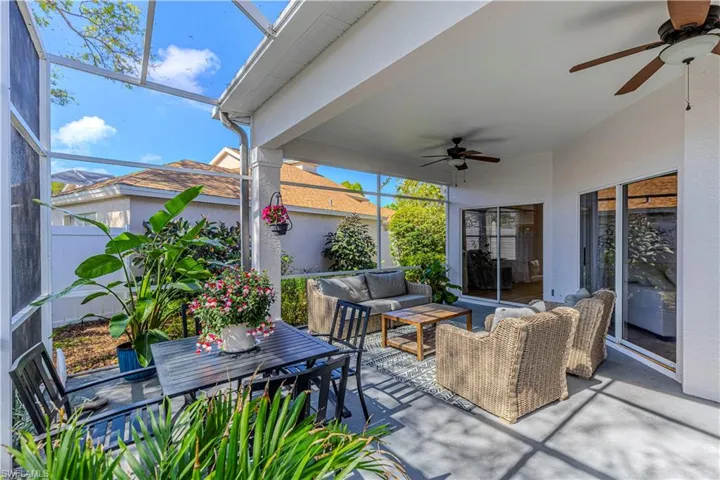 Great outdoor entertainment lounge area with ceiling fans