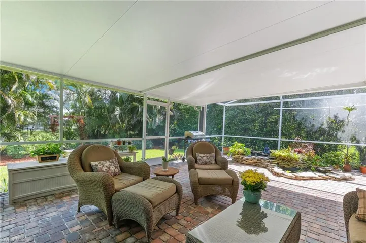 Brick paved covered outdoor screen lanai