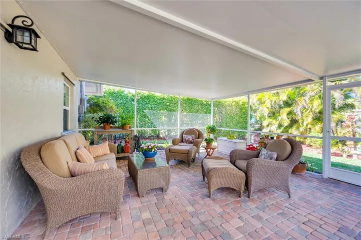233 SQ FT Brick paved covered outdoor screen lanai