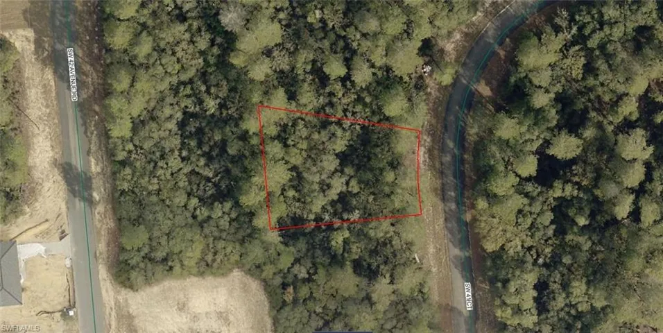 Aerial Property Map. Displaying the boundaries of the property in a wooded area