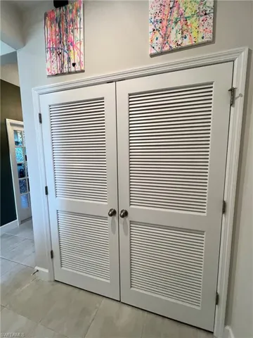 Beautiful and spacious laundry closet.
