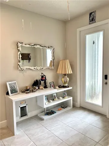 Bright and airy foyer. With storage closet.