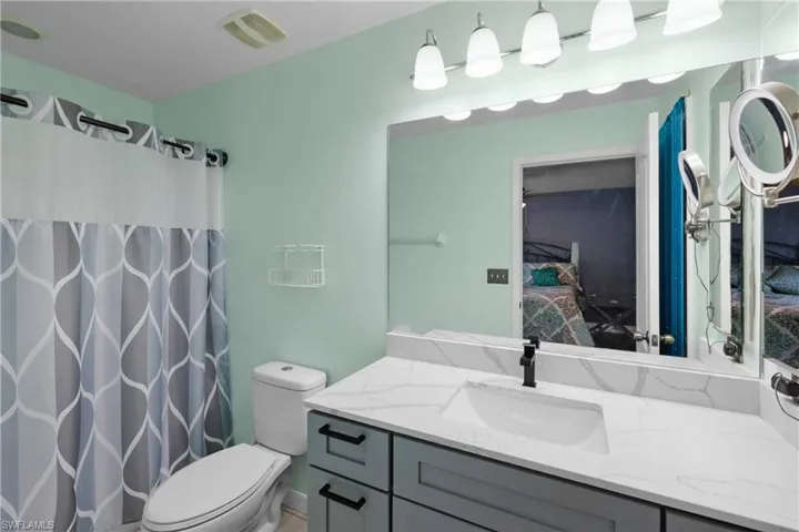 Master bath tub/shower combo and linen closet
