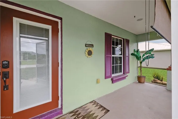 Screened porch with roll down shade