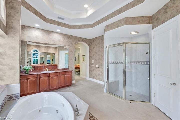 Dual Vanities, Large Walk-In Shower & Soaking Tub, Private WC & Bidet