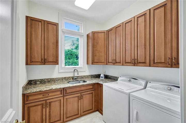 Renovated Utility Room w/ Granite-Topped Custom Wood Cabinetry