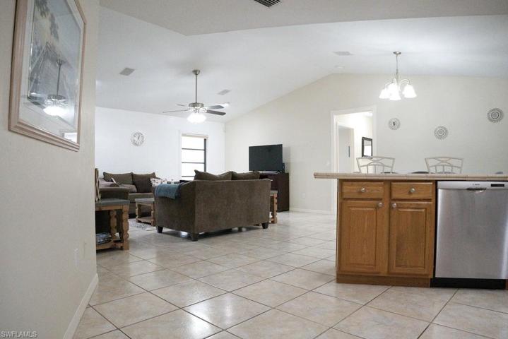 View from the laundry room to the family area and kitchen.