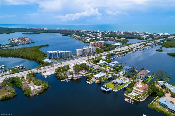 Surrounded by multi-million $$$ homes in Barefoot Beach and Little Hickory Shores!